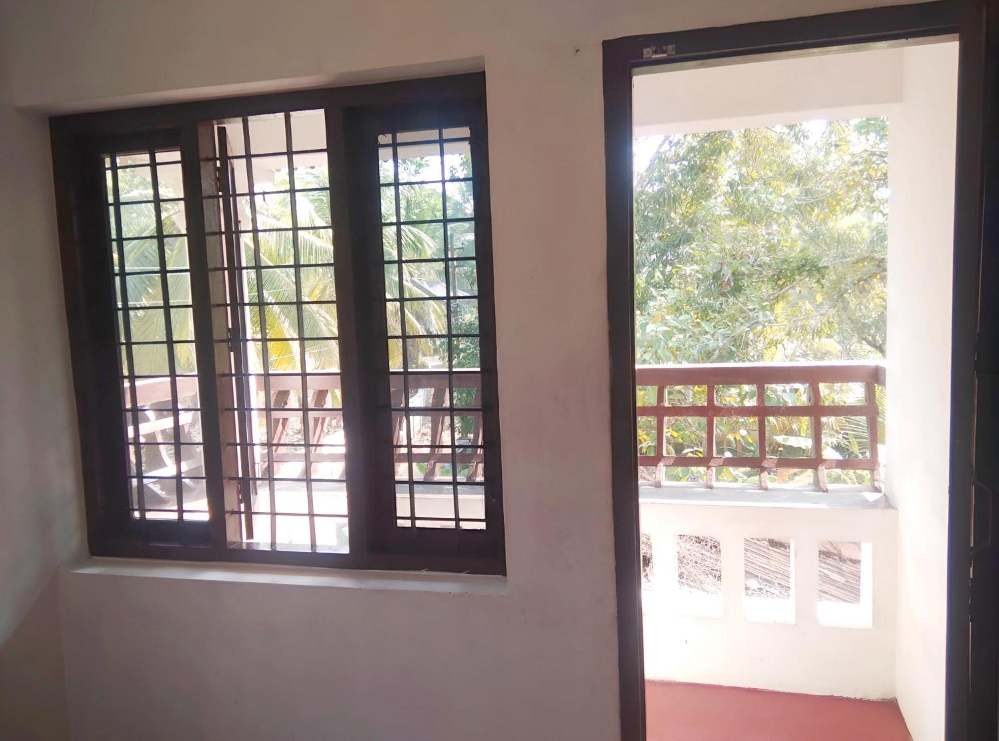 Thachattu Homestay Vaikom ภายนอก รูปภาพ